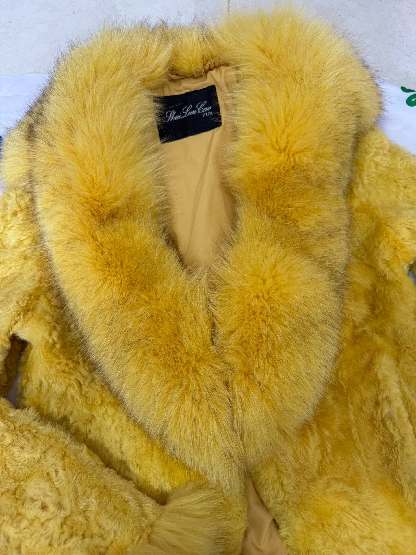 Vintage creamy-yellow genuine fur coat