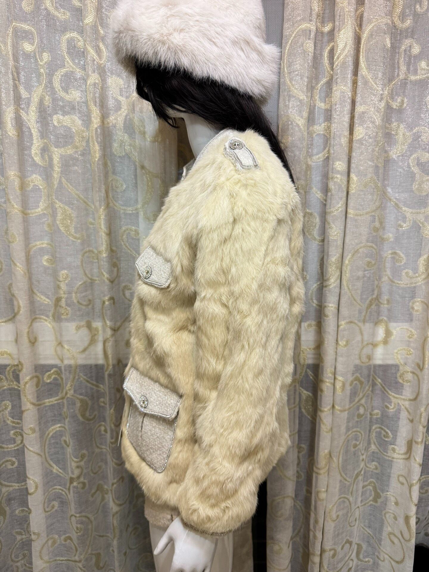 Vintage cream-colored genuine fur coat