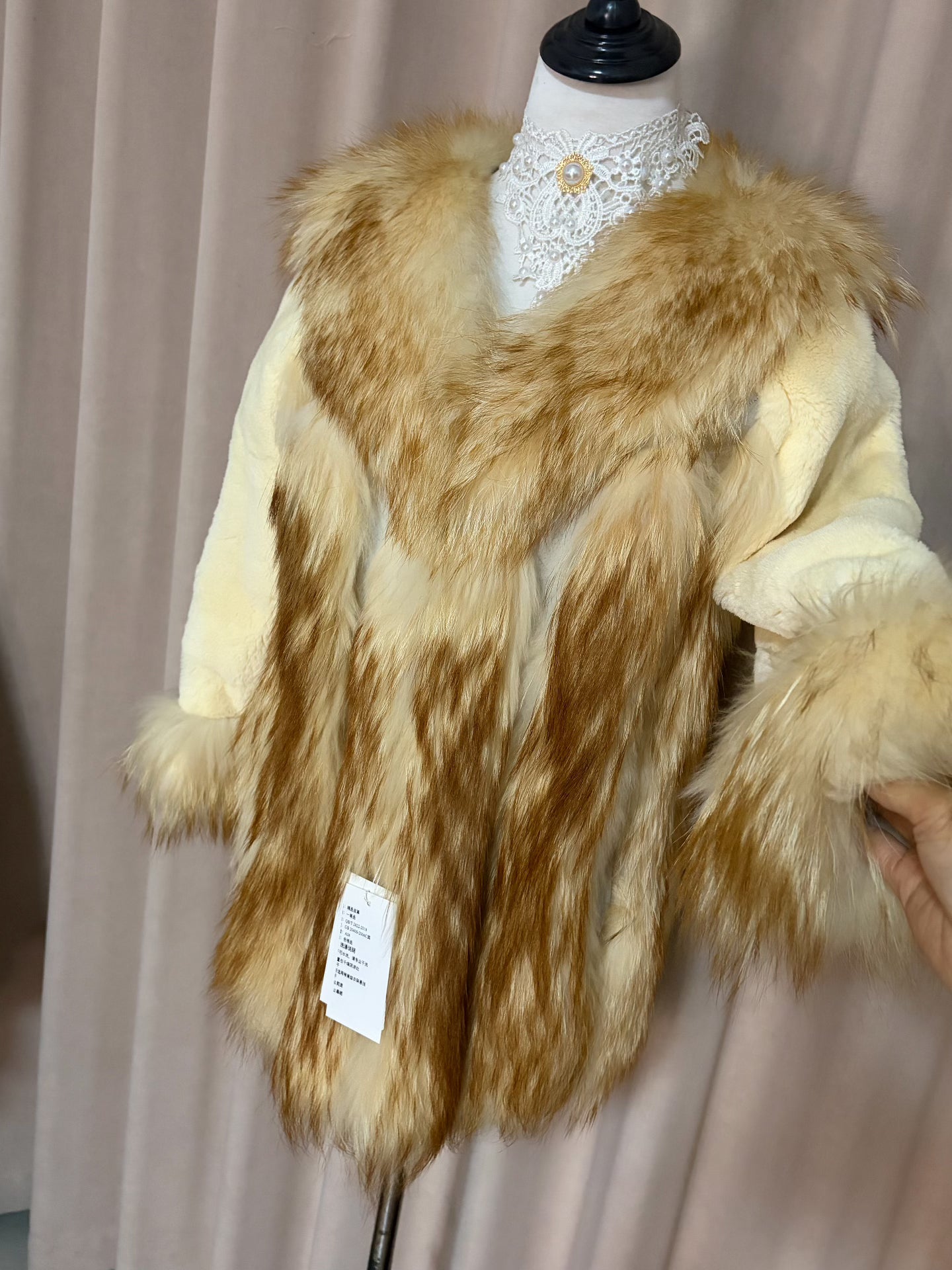 Vintage creamy-white genuine fur coat