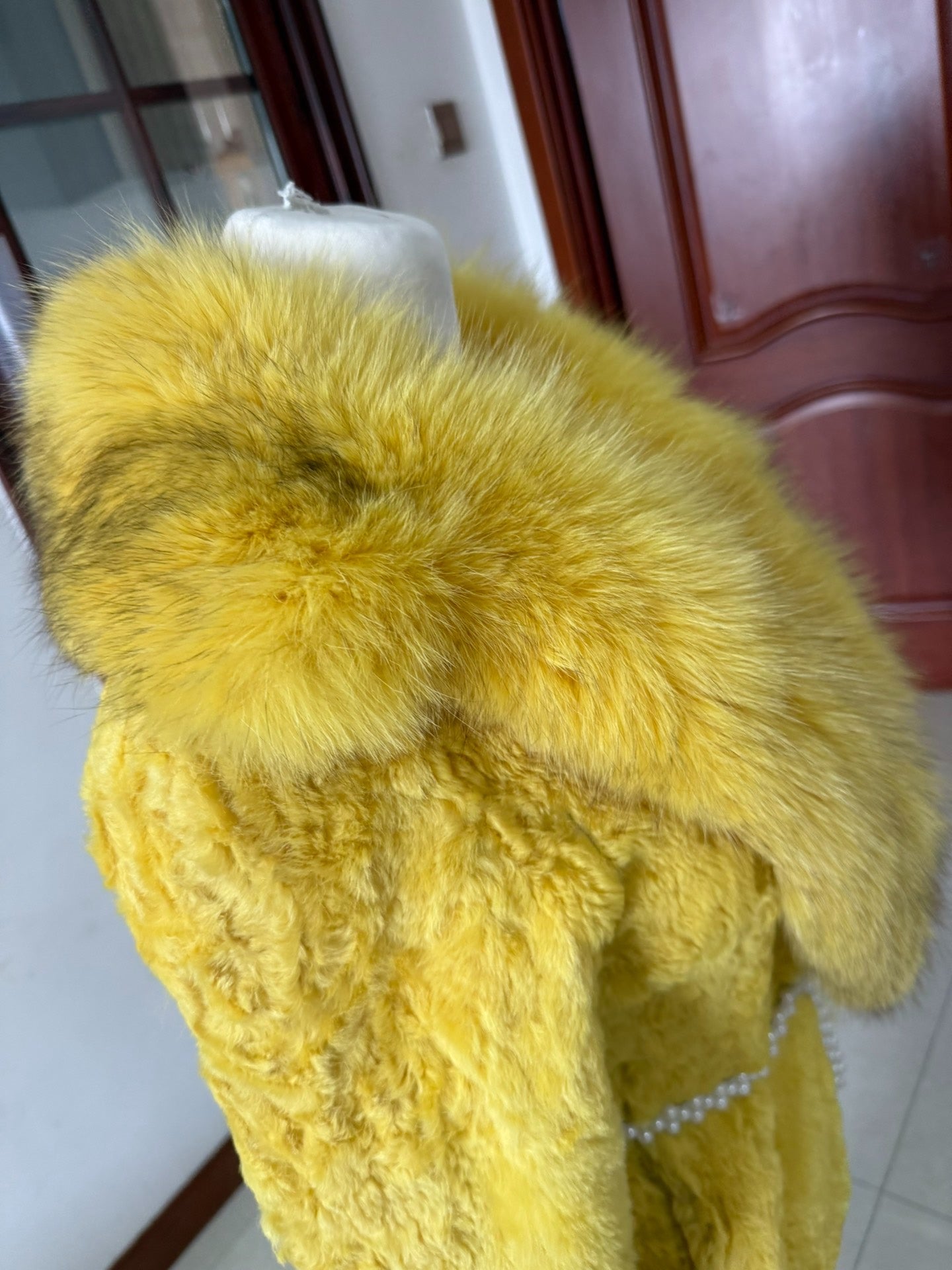 Vintage creamy-yellow genuine fur coat