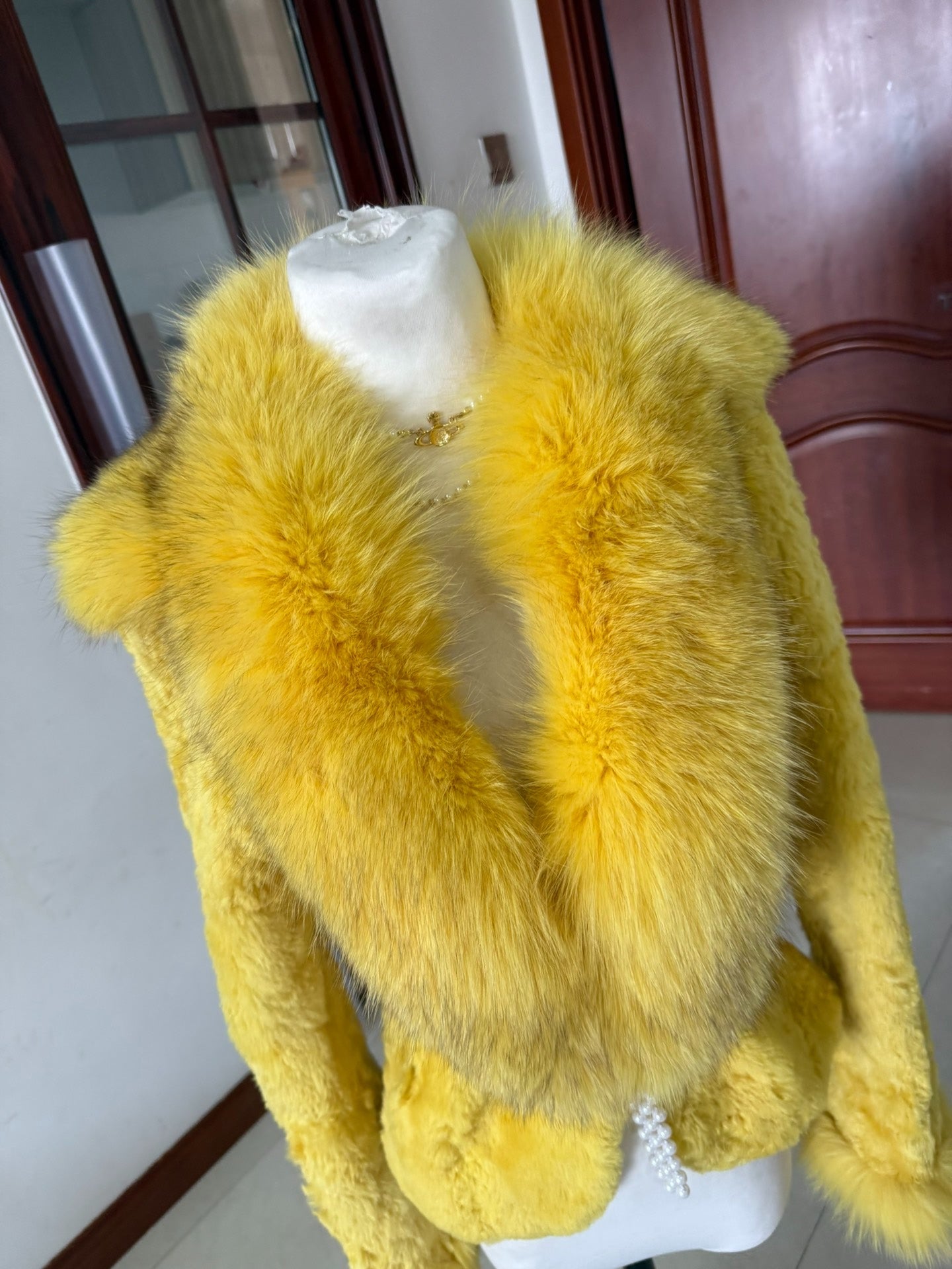 Vintage creamy-yellow genuine fur coat