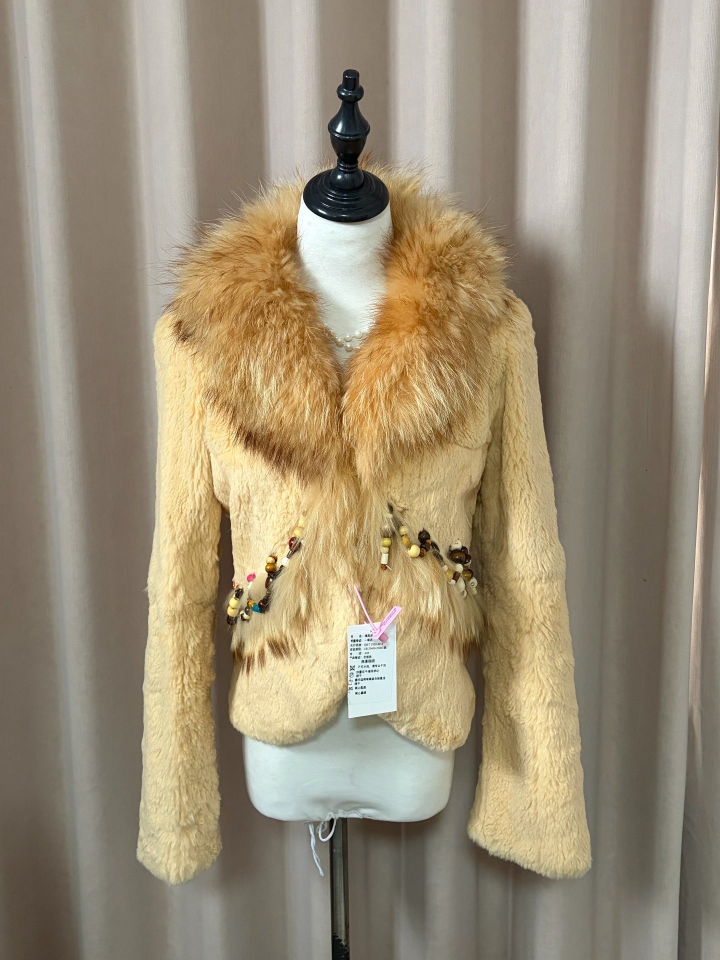 Vintage creamy-yellow genuine fur coat