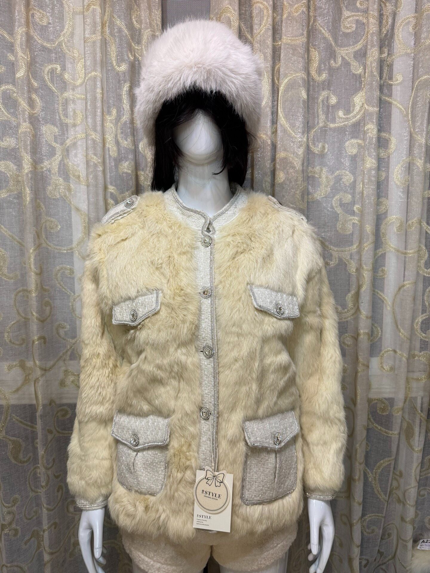 Vintage cream-colored genuine fur coat