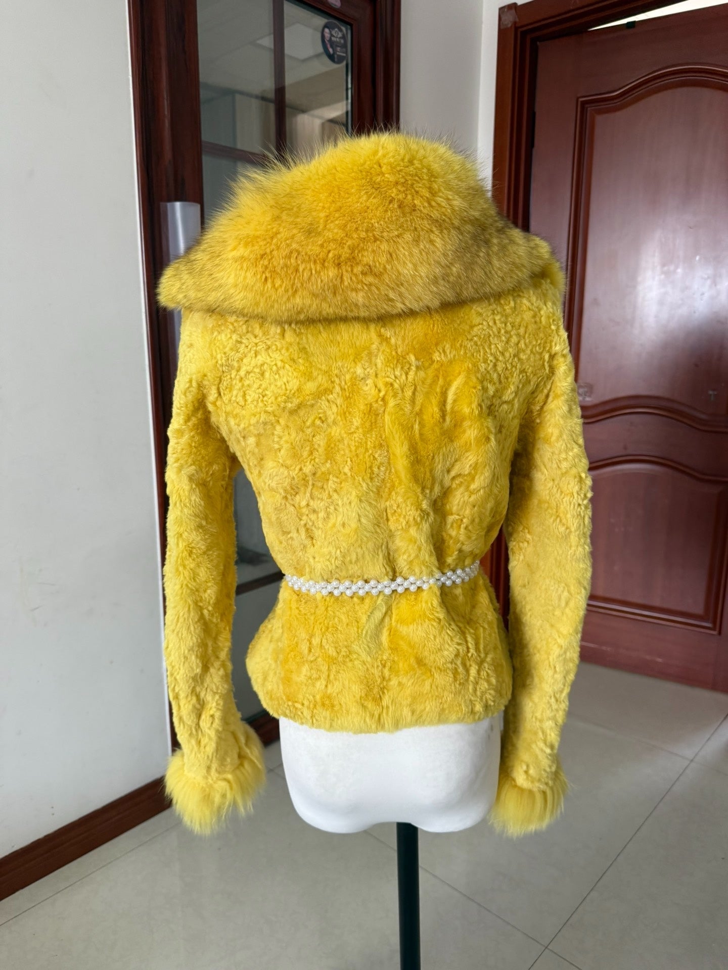 Vintage creamy-yellow genuine fur coat
