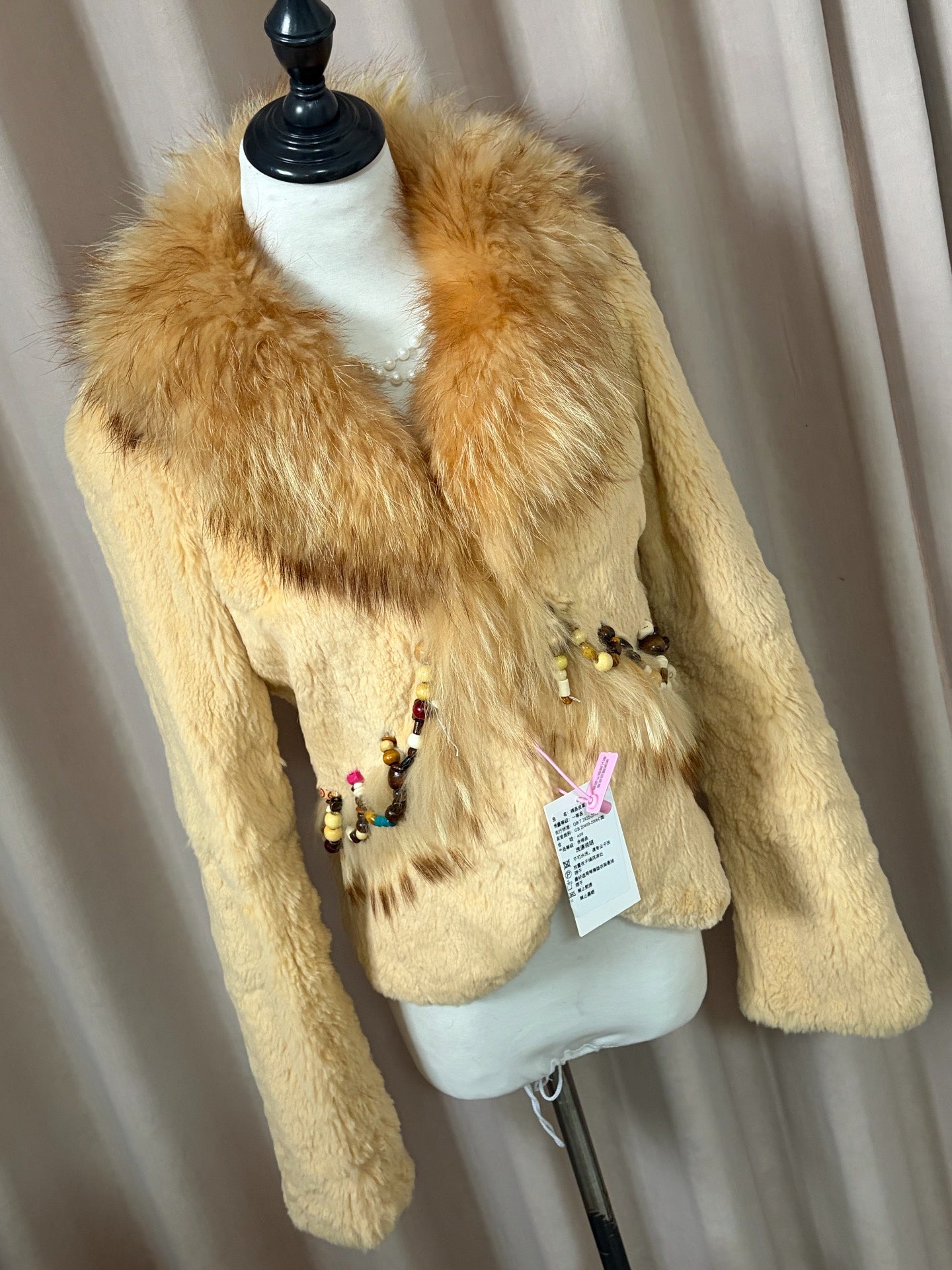Vintage creamy-yellow genuine fur coat