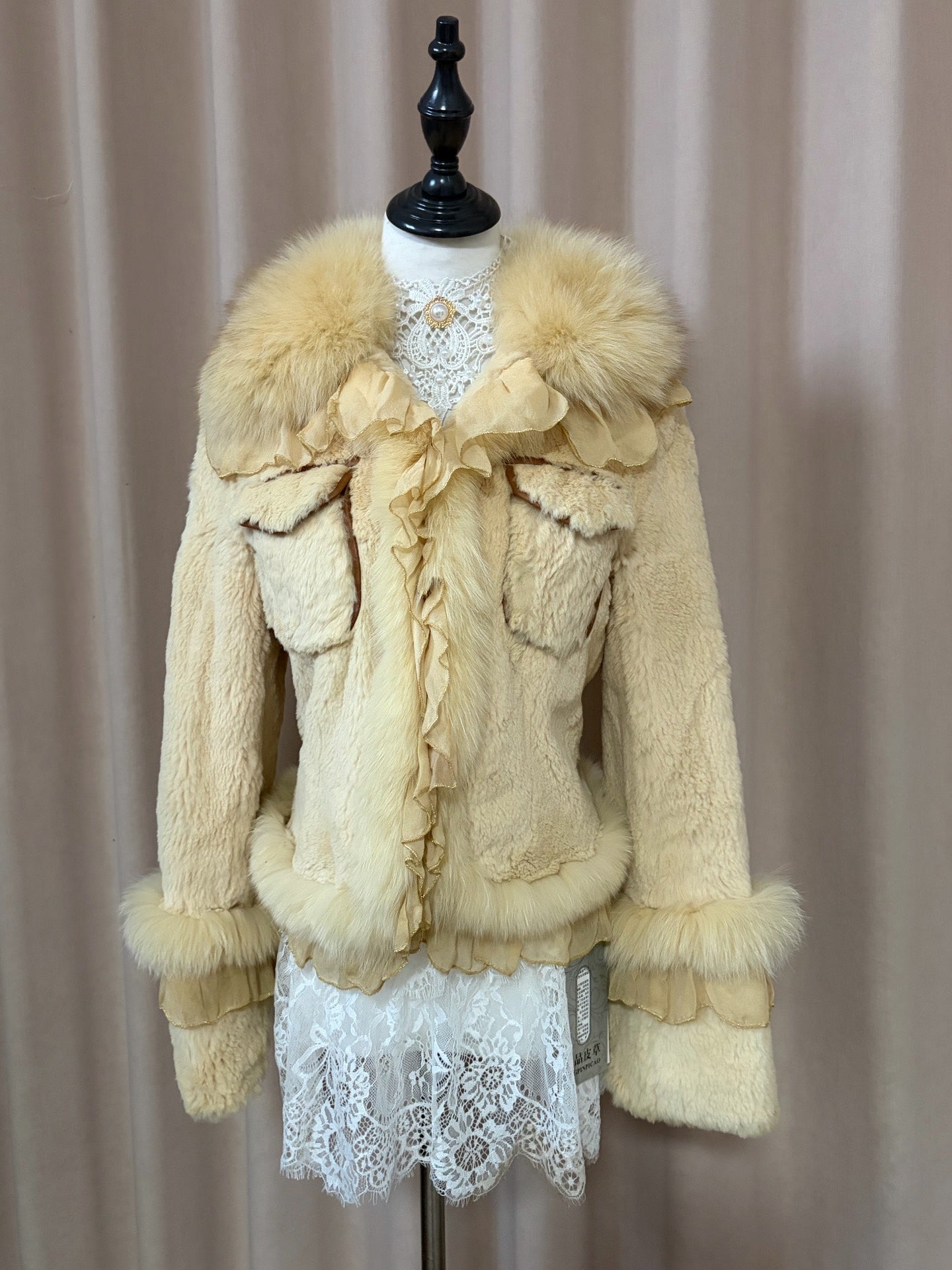 Vintage cream-colored genuine fur coat