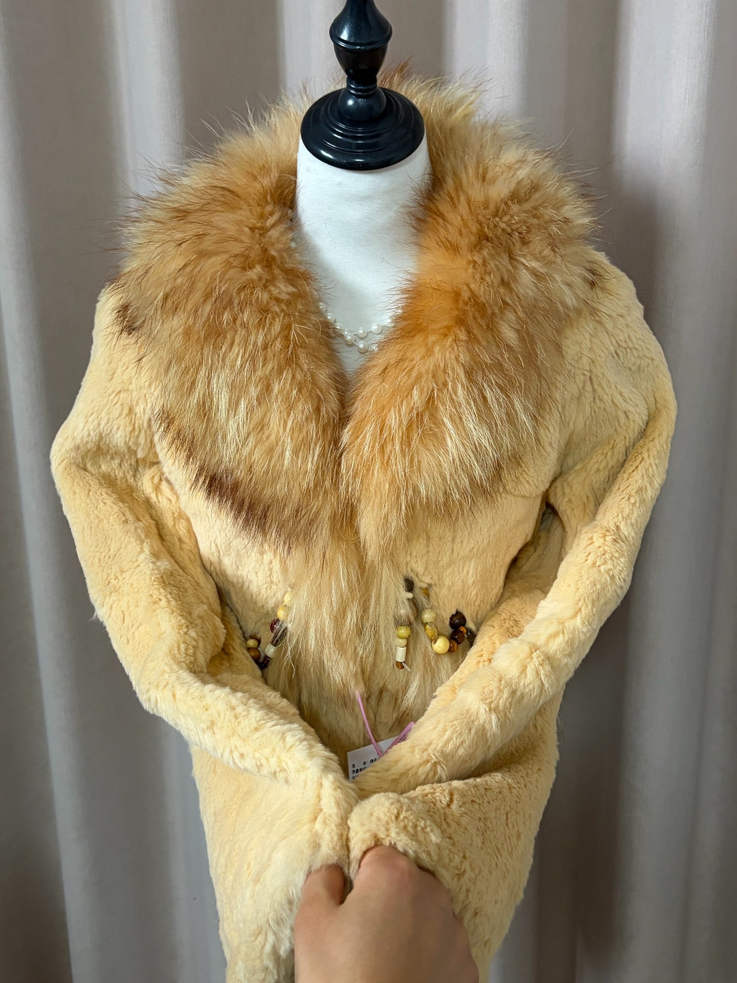 Vintage creamy-yellow genuine fur coat