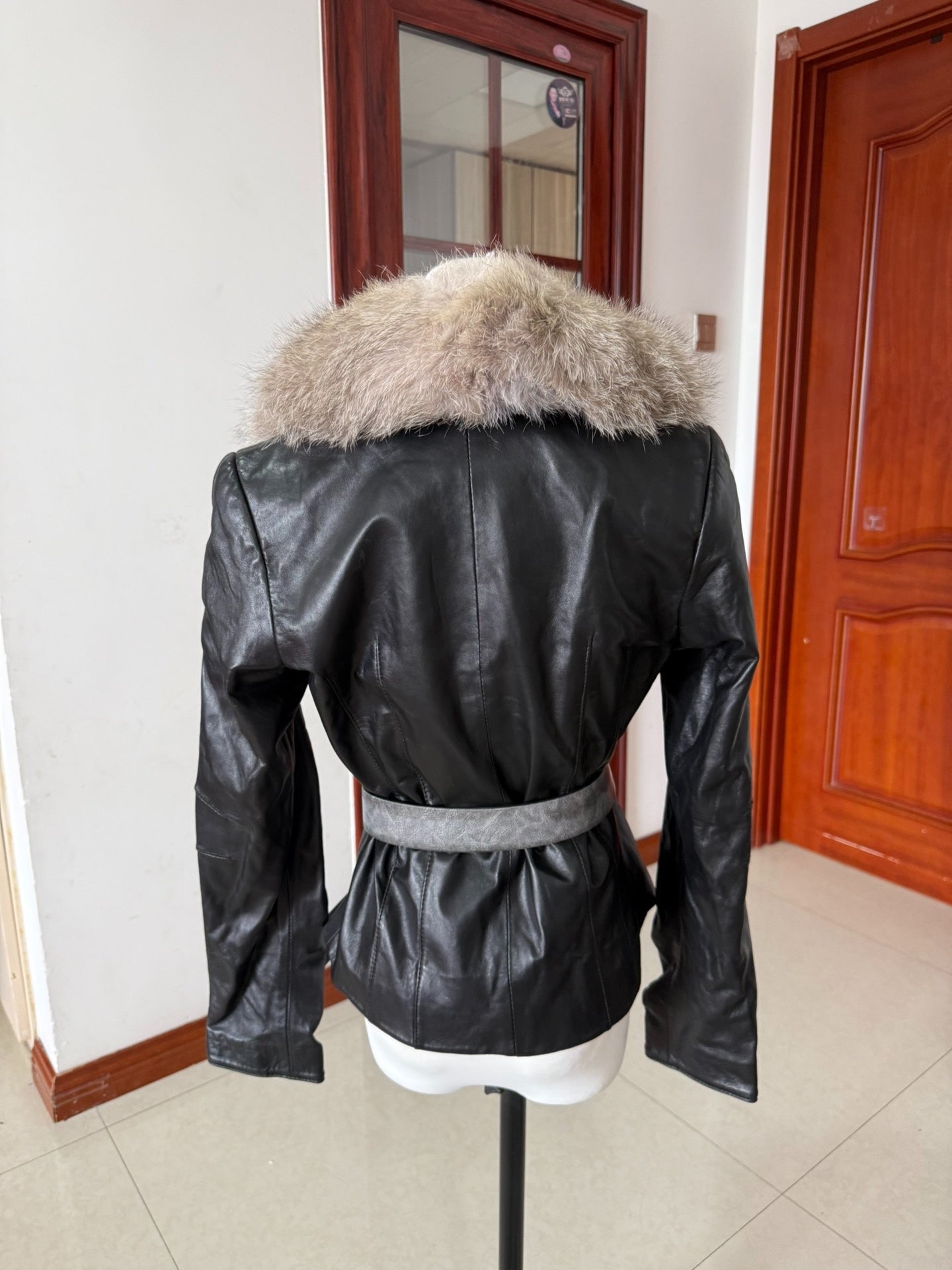 Vintage black leather jacket with fox fur collar