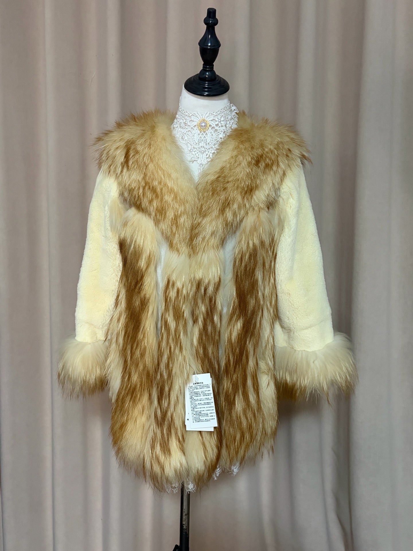 Vintage creamy-white genuine fur coat
