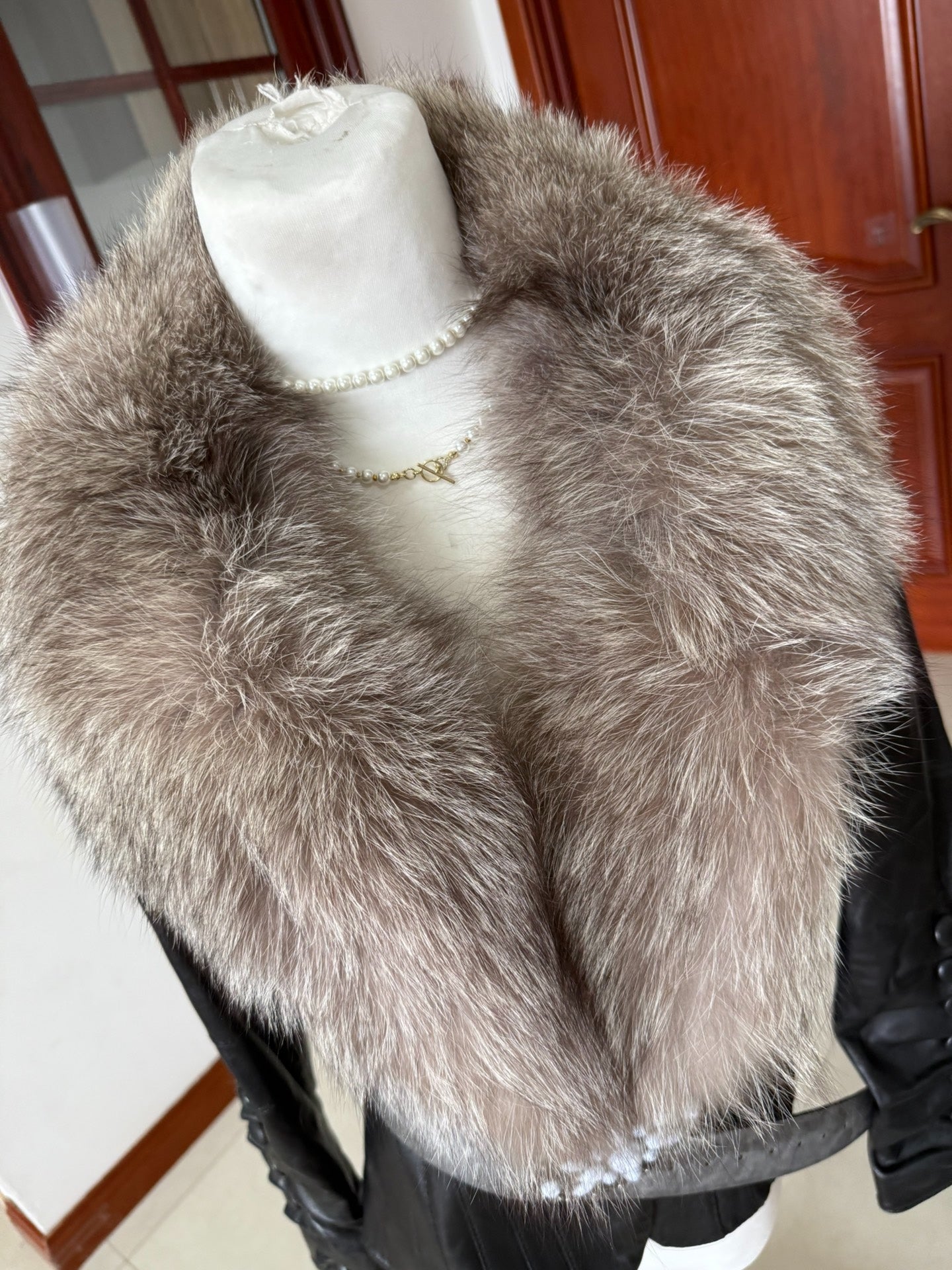 Vintage black leather jacket with fox fur collar