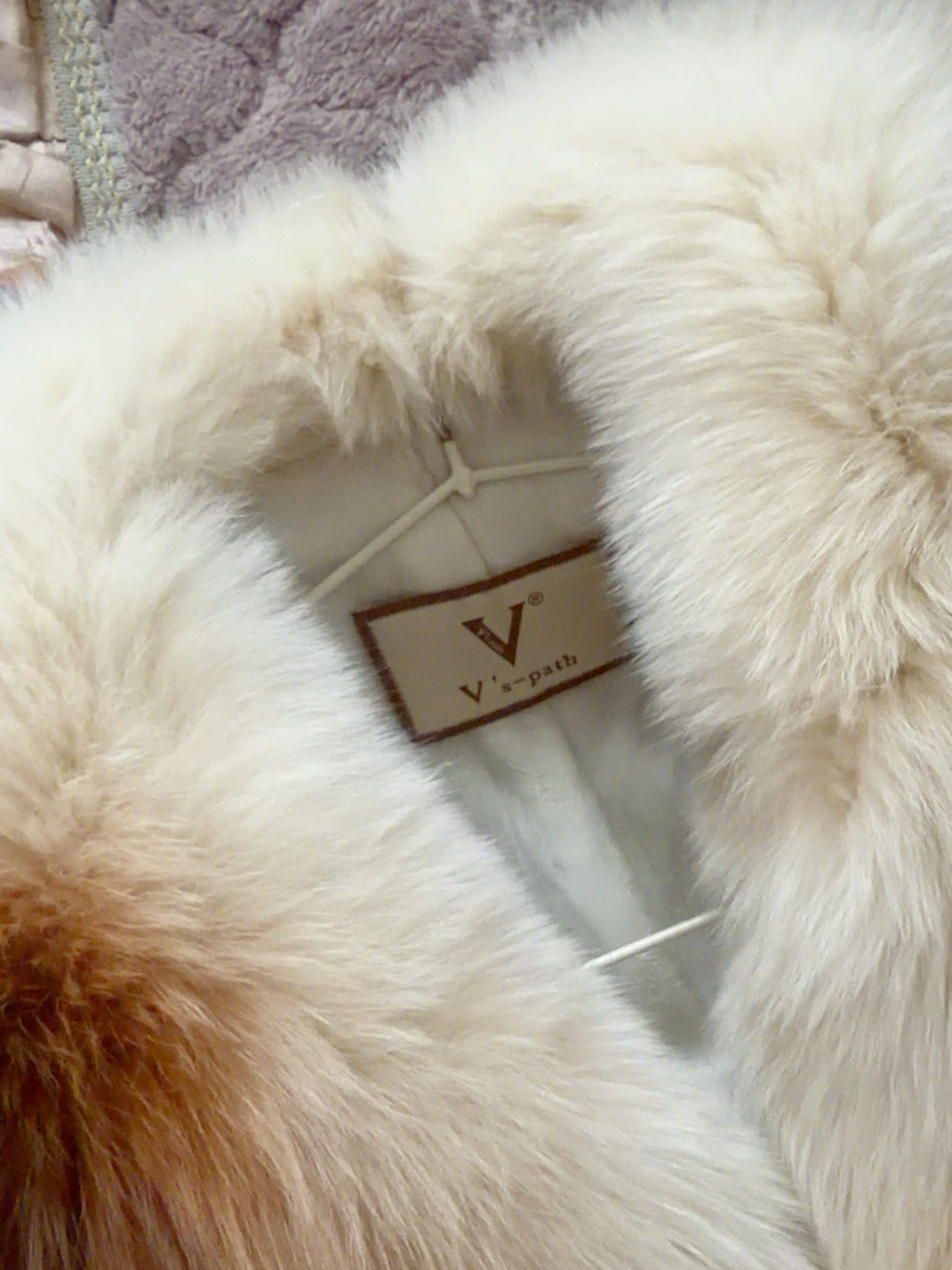 Vintage creamy-white genuine fur coat
