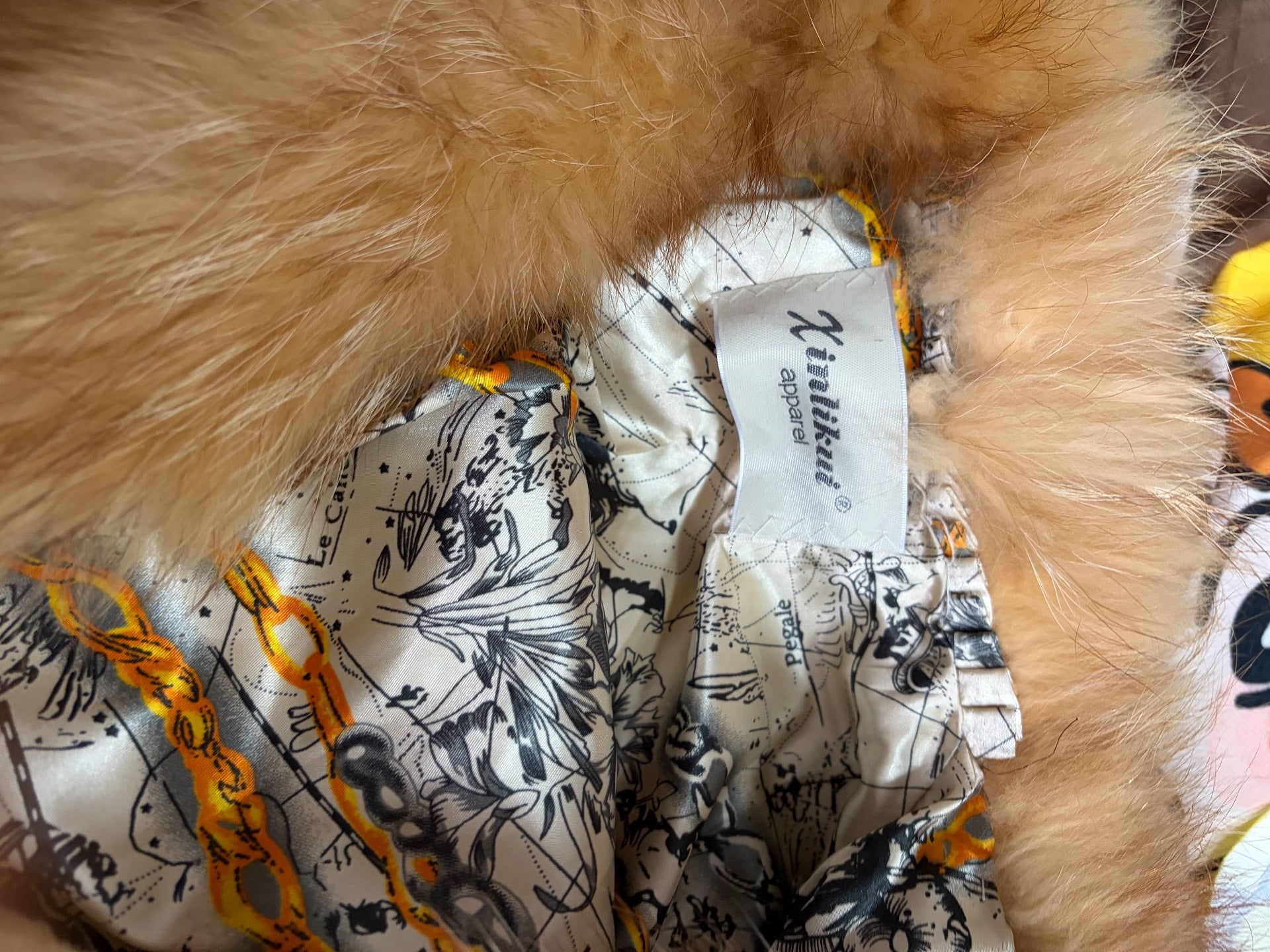 Vintage creamy-yellow genuine fur coat