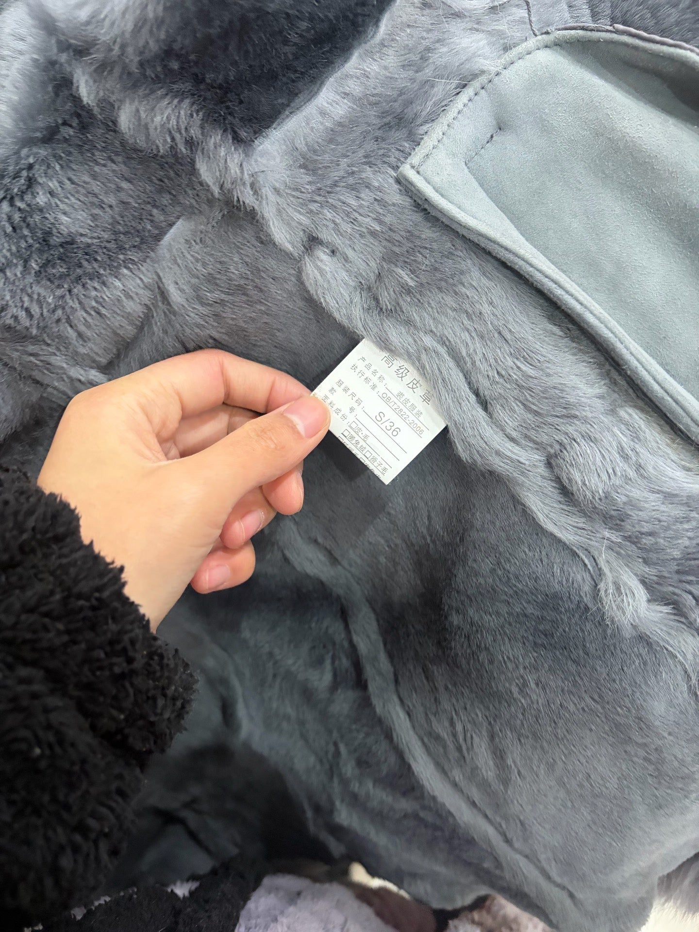 Vintage light gray mid-length genuine fur coat